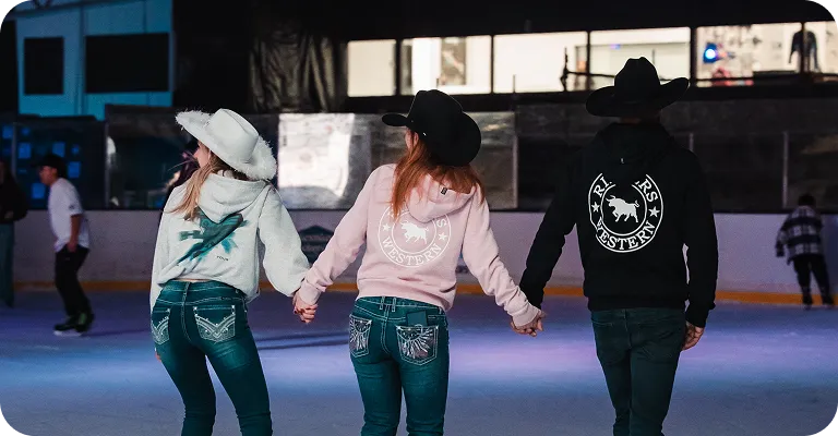 Friends skating together at Ice Arena Adelaide