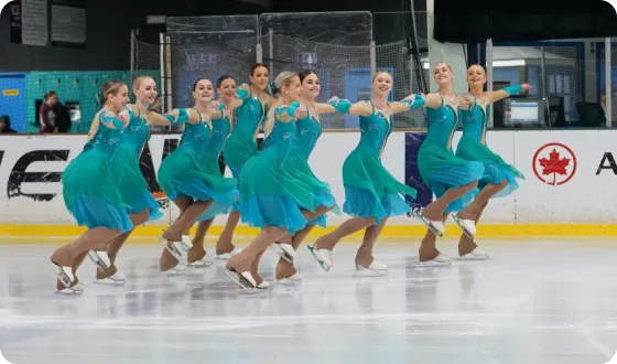 Synchronised skating team performing on the ice